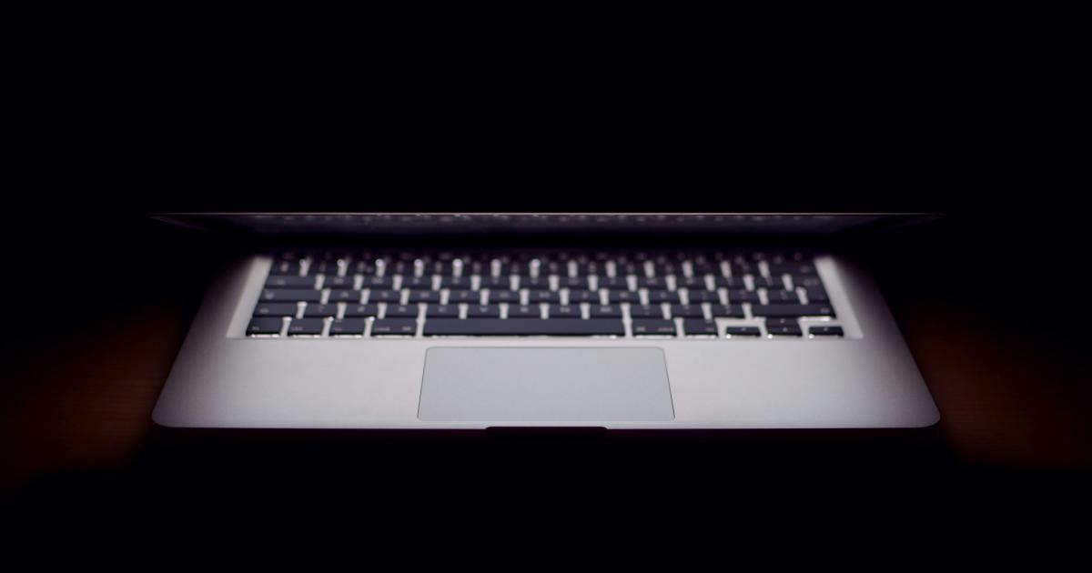Businessman Struggling with Laptop
