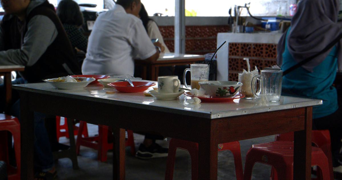 Customers Enjoying a Meal at a Local Restaurant