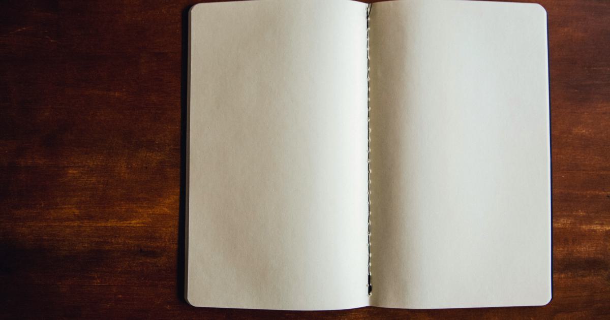Person writing in a notebook