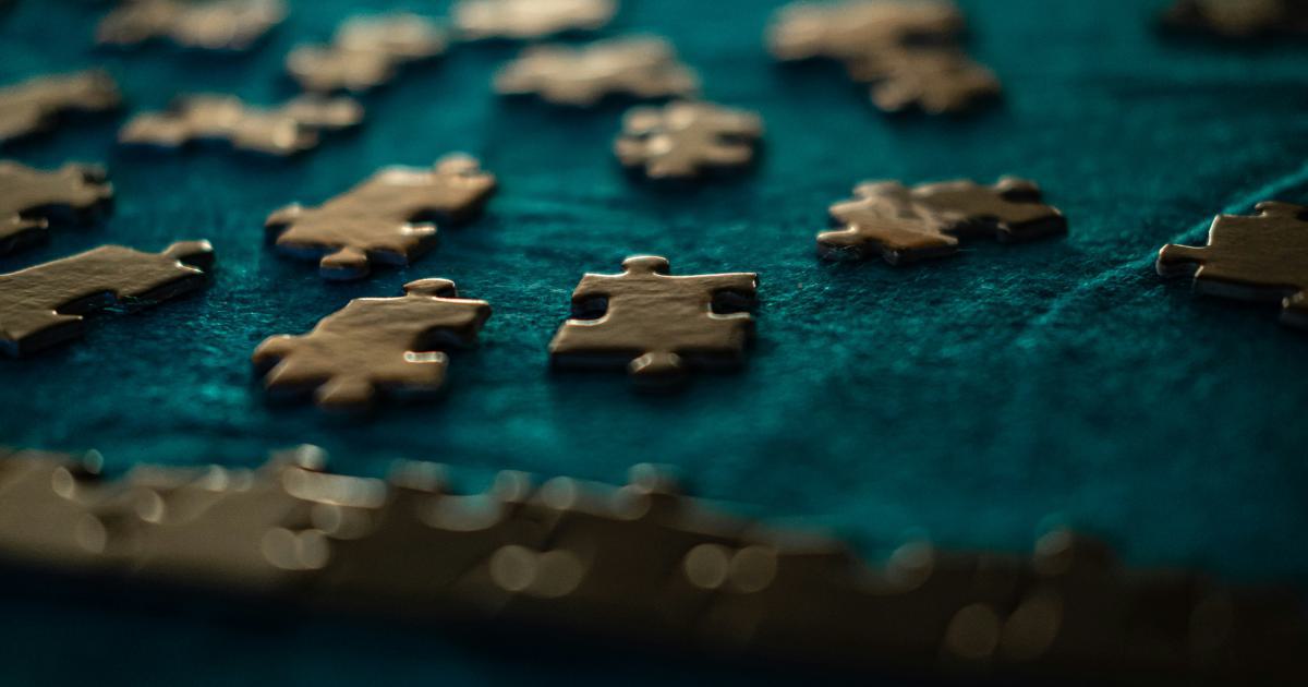Puzzle Pieces Forming Link