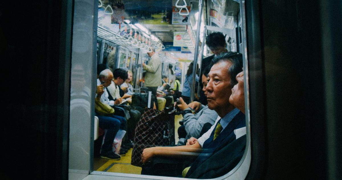 Commuter on Smartphone