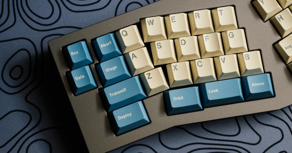 Hands Typing on Keyboard