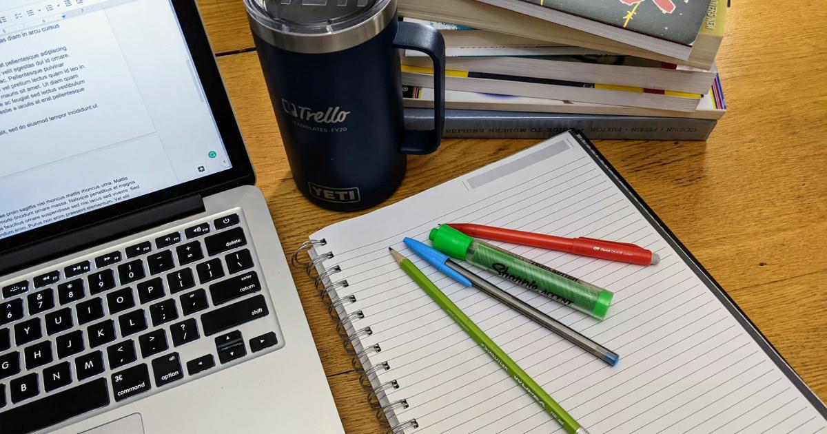 Laptop with Pen and Notebook
