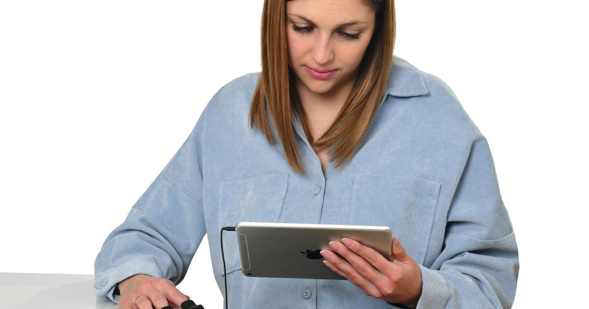 Businesswoman Checking Laptop
