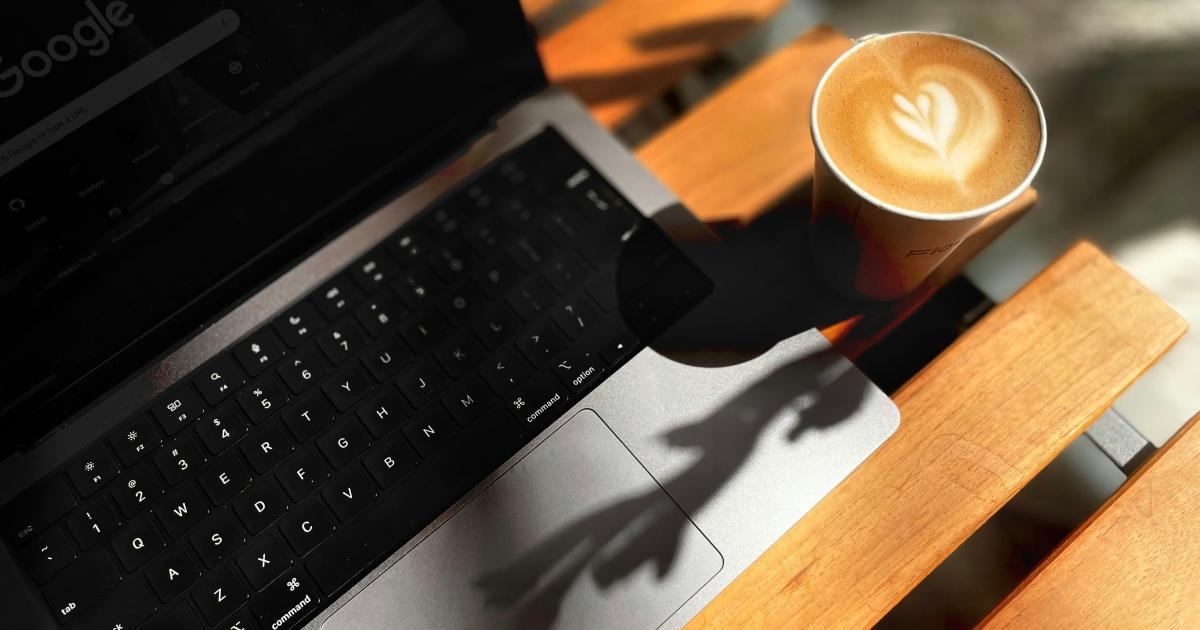 Writer Typing on Laptop