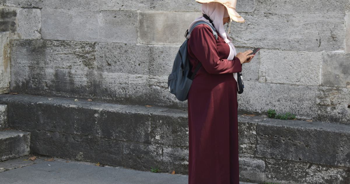 Woman Searching on Smartphone