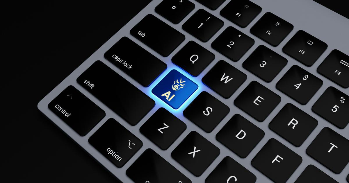 Magnifying Glass on a Laptop Keyboard