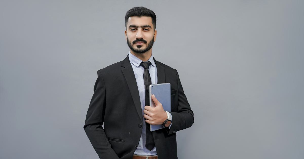 A business owner addressing a reputation crisis on a computer