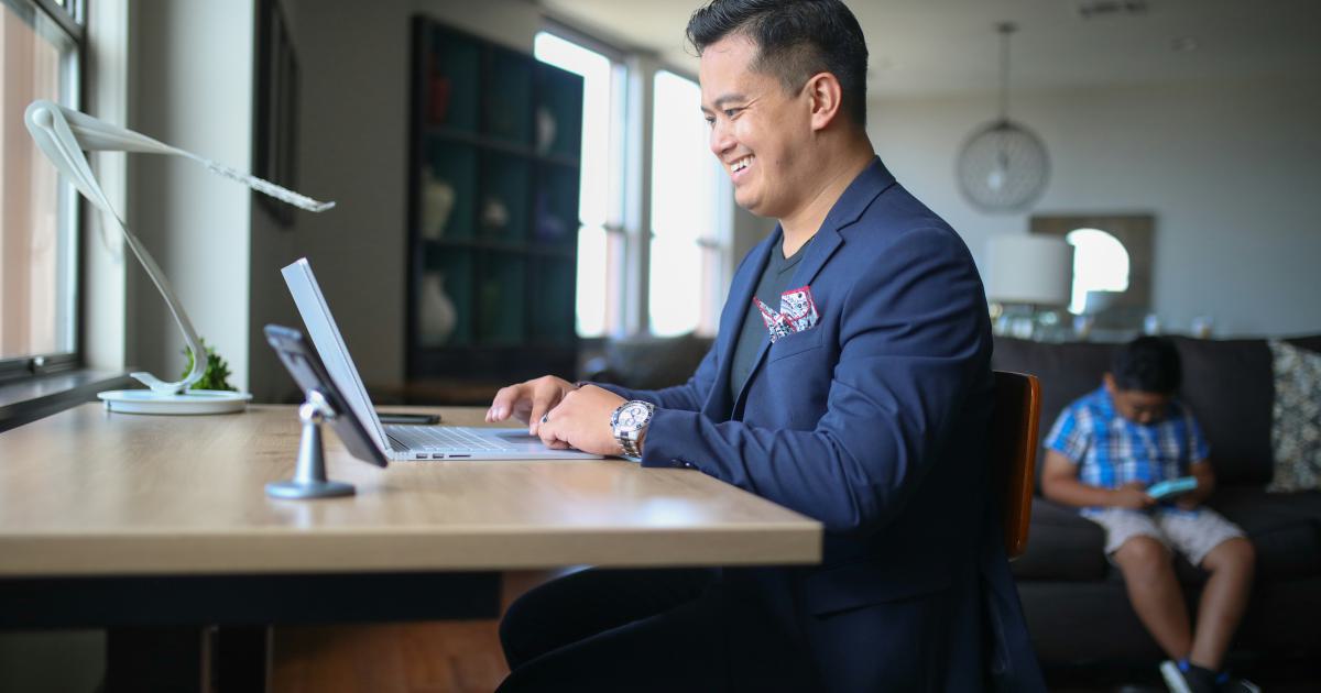 A business owner monitoring reviews on a tablet
